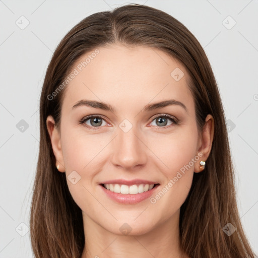 Joyful white young-adult female with long  brown hair and grey eyes