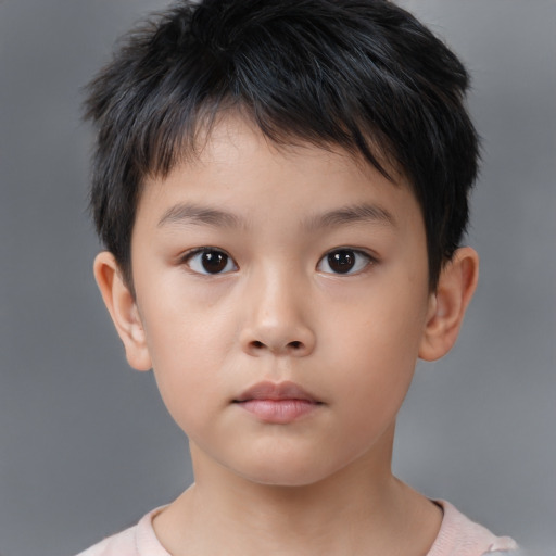 Neutral asian child male with short  brown hair and brown eyes