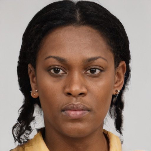 Neutral black young-adult female with short  brown hair and brown eyes