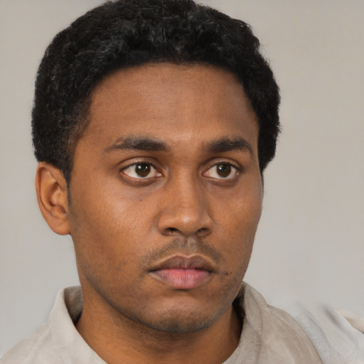 Neutral latino young-adult male with short  brown hair and brown eyes