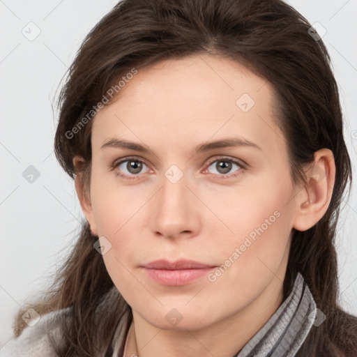 Neutral white young-adult female with long  brown hair and brown eyes