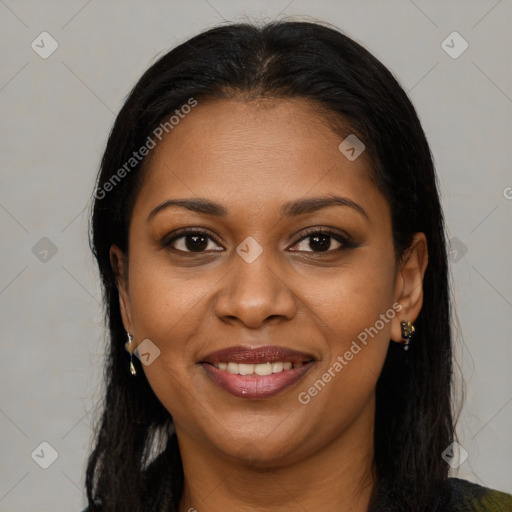Joyful black young-adult female with long  brown hair and brown eyes