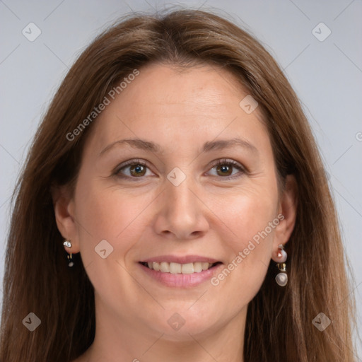 Joyful white adult female with long  brown hair and grey eyes