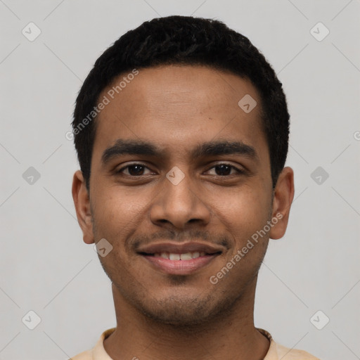 Joyful black young-adult male with short  black hair and brown eyes