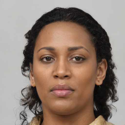 Neutral black young-adult female with long  black hair and brown eyes