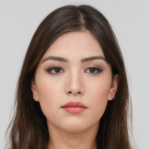 Neutral asian young-adult female with long  brown hair and brown eyes