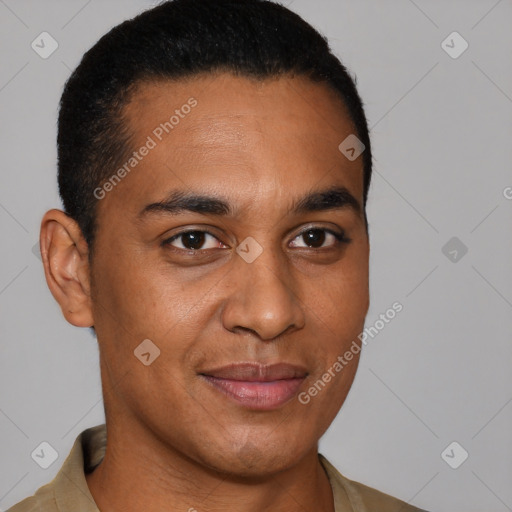 Joyful latino young-adult male with short  brown hair and brown eyes