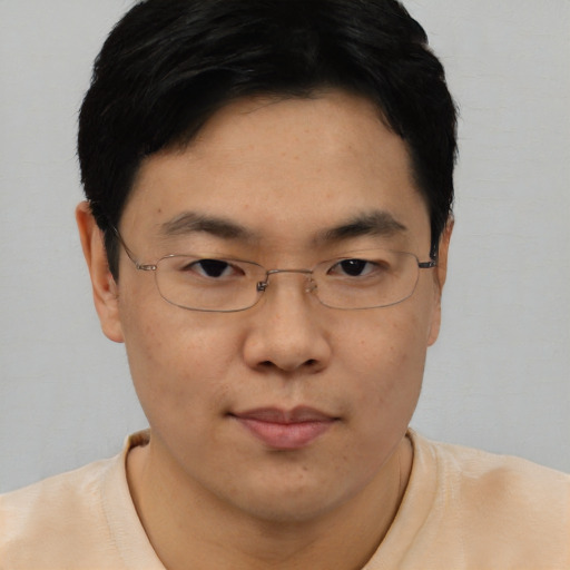 Neutral asian young-adult male with short  brown hair and brown eyes