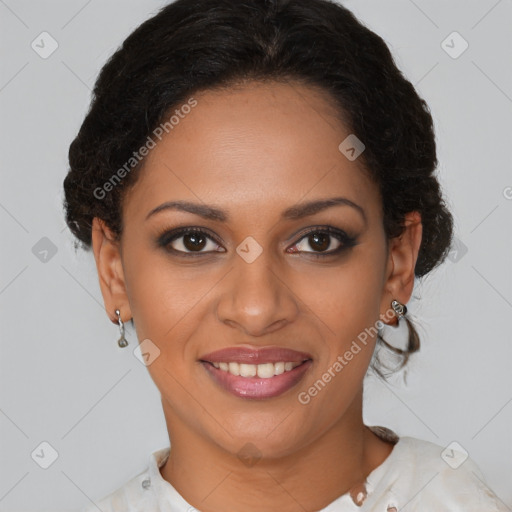 Joyful black young-adult female with short  brown hair and brown eyes