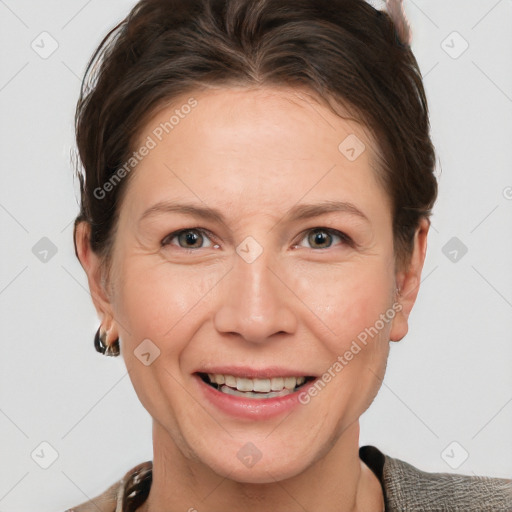 Joyful white adult female with short  brown hair and brown eyes