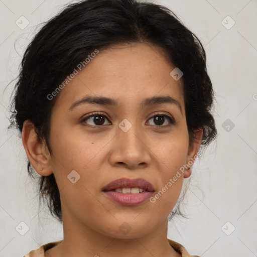 Joyful latino young-adult female with medium  brown hair and brown eyes