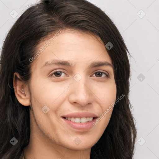 Joyful white young-adult female with long  brown hair and brown eyes