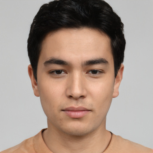 Neutral white young-adult male with short  black hair and brown eyes