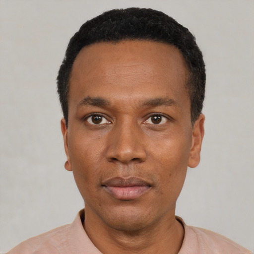 Neutral latino adult male with short  black hair and brown eyes