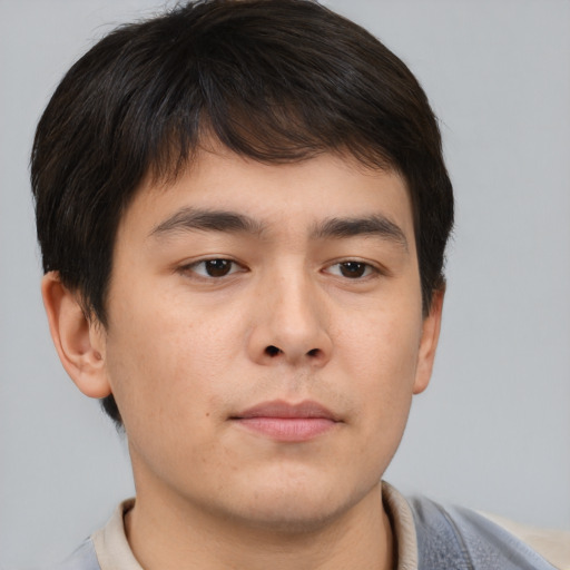 Neutral asian young-adult male with short  brown hair and brown eyes