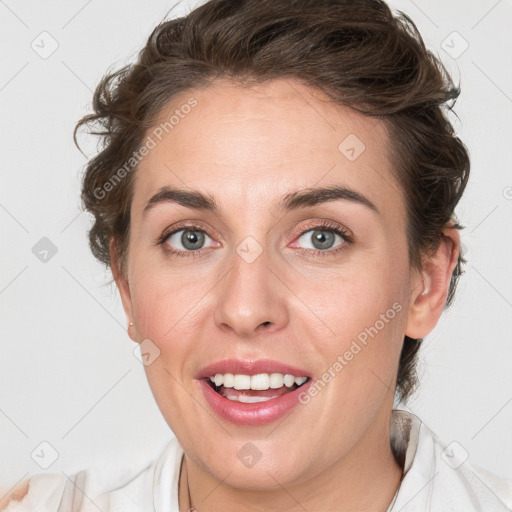 Joyful white young-adult female with medium  brown hair and blue eyes