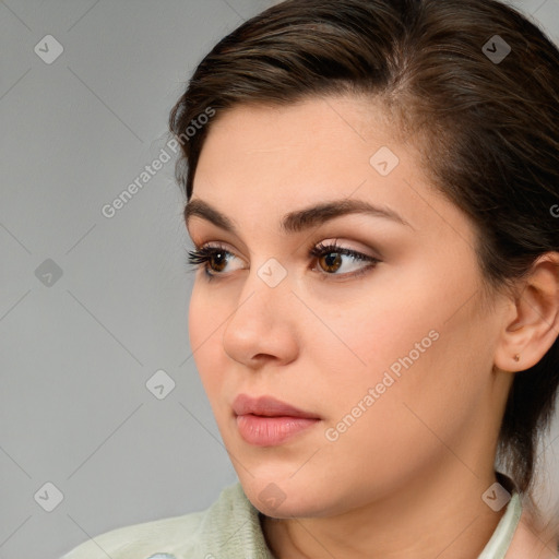 Neutral white young-adult female with medium  brown hair and brown eyes