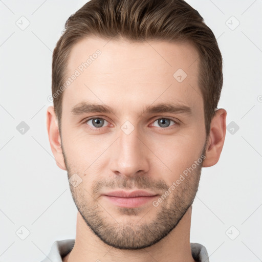 Neutral white young-adult male with short  brown hair and grey eyes