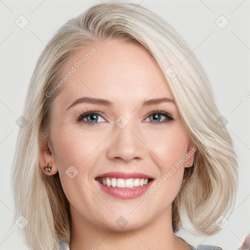 Joyful white young-adult female with long  brown hair and blue eyes