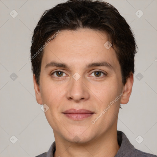 Joyful white adult male with short  brown hair and brown eyes