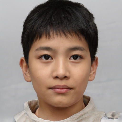 Neutral asian child male with short  brown hair and brown eyes
