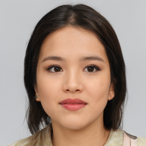 Neutral asian young-adult female with medium  brown hair and brown eyes