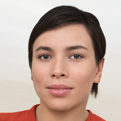 Neutral white young-adult female with short  brown hair and brown eyes