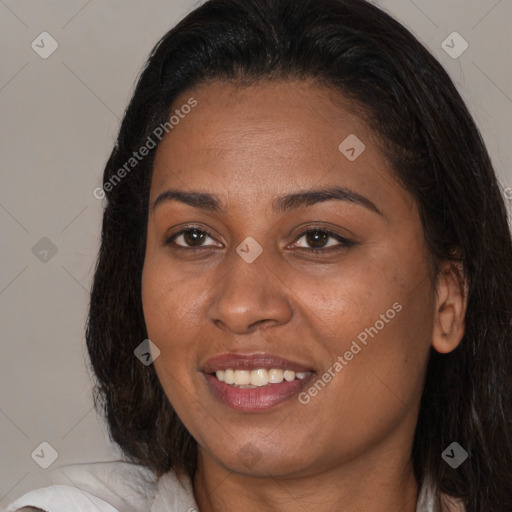 Joyful latino young-adult female with medium  brown hair and brown eyes