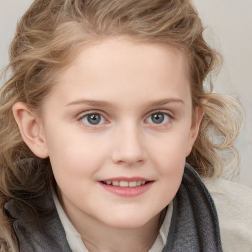 Joyful white child female with long  brown hair and blue eyes