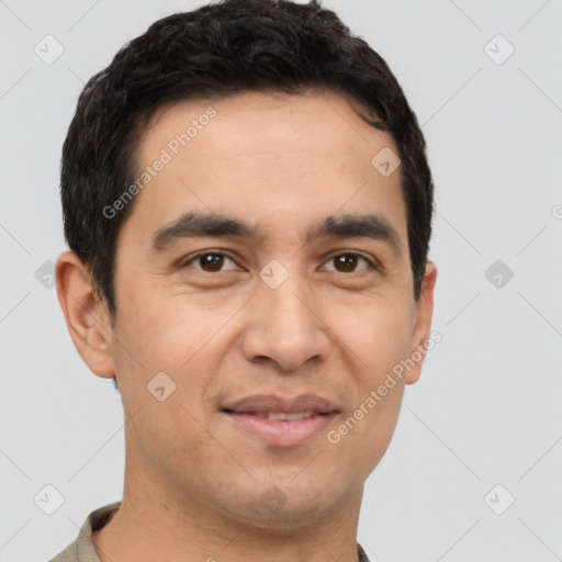 Joyful latino young-adult male with short  black hair and brown eyes