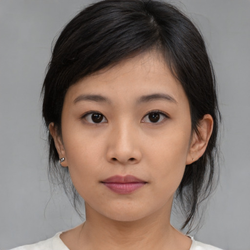 Neutral asian young-adult female with medium  black hair and brown eyes