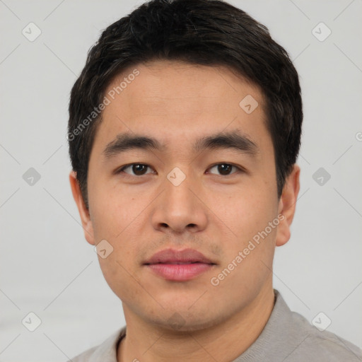 Neutral asian young-adult male with short  brown hair and brown eyes