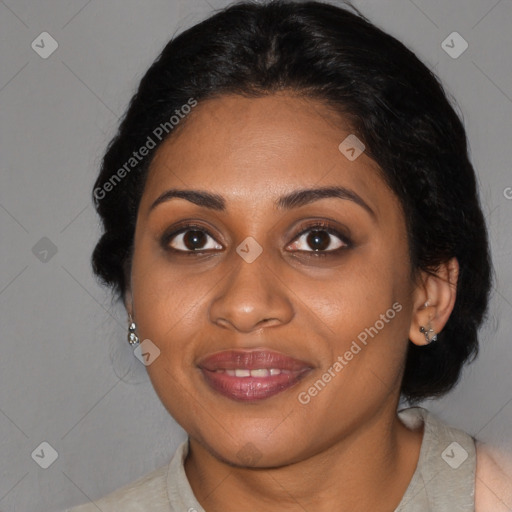 Joyful black young-adult female with medium  brown hair and brown eyes