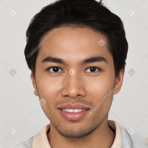 Joyful asian young-adult male with short  brown hair and brown eyes