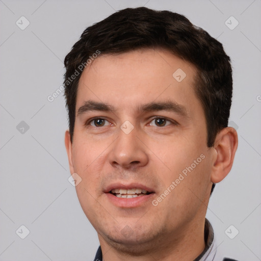 Joyful white young-adult male with short  brown hair and brown eyes