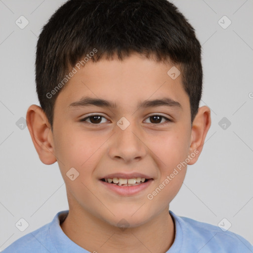 Joyful white child male with short  brown hair and brown eyes