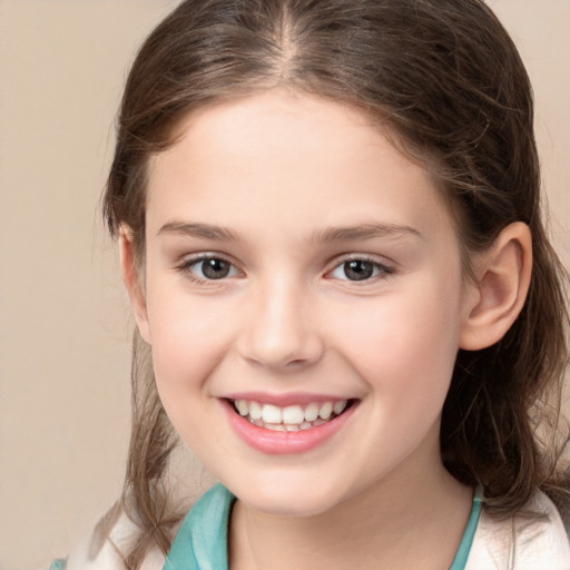 Joyful white child female with medium  brown hair and brown eyes