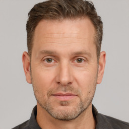 Neutral white adult male with short  brown hair and brown eyes