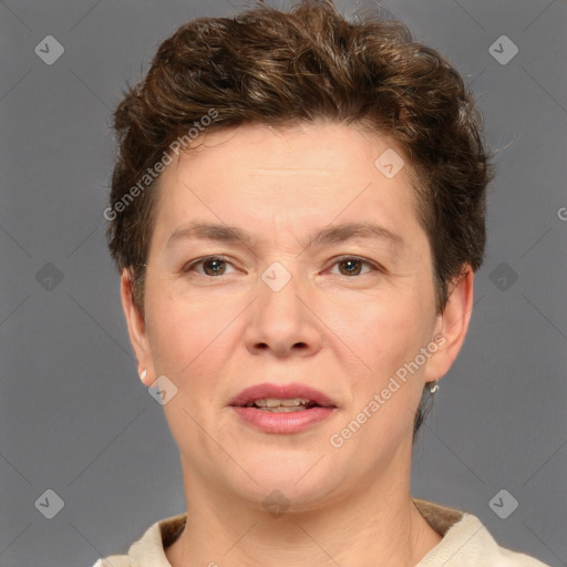 Joyful white adult female with short  brown hair and brown eyes