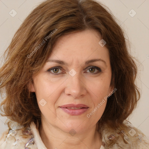 Joyful white adult female with medium  brown hair and brown eyes