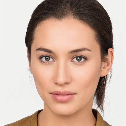 Neutral white young-adult female with medium  brown hair and brown eyes