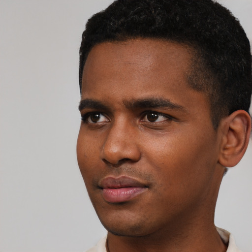 Neutral black young-adult male with short  black hair and brown eyes