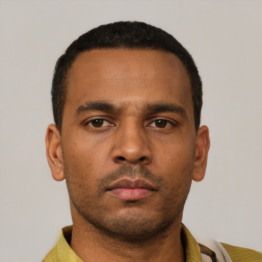 Neutral latino young-adult male with short  brown hair and brown eyes