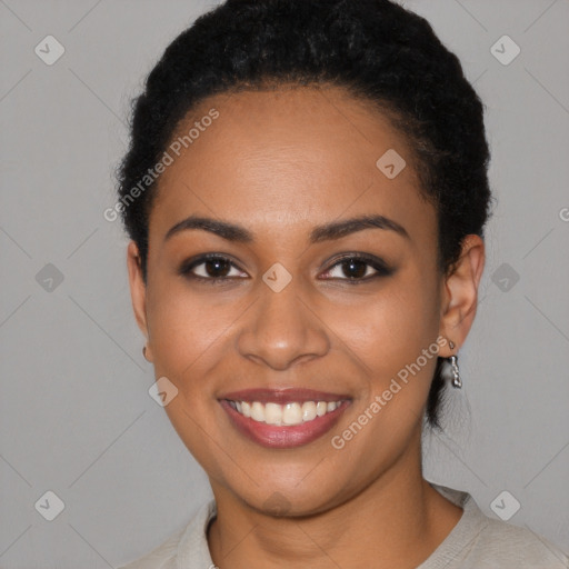 Joyful latino young-adult female with short  black hair and brown eyes