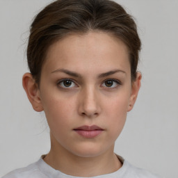 Neutral white young-adult female with short  brown hair and brown eyes