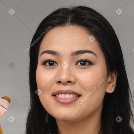 Joyful asian young-adult female with long  black hair and brown eyes