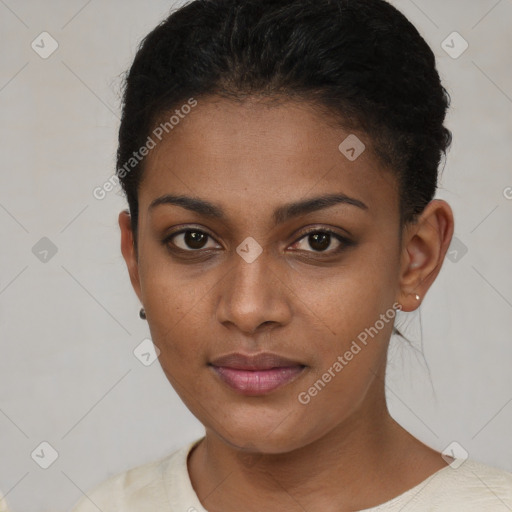 Joyful black young-adult female with short  brown hair and brown eyes