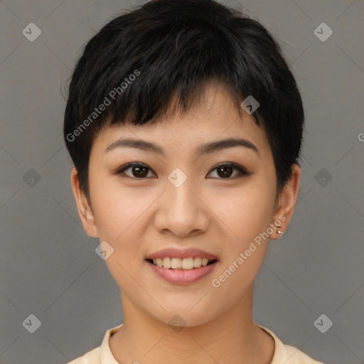 Joyful asian young-adult female with short  brown hair and brown eyes