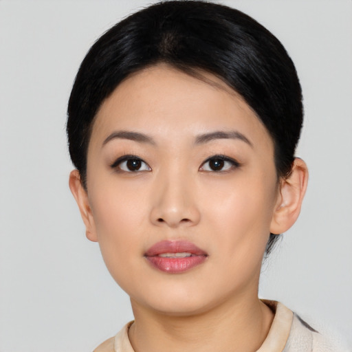 Neutral asian young-adult female with short  black hair and brown eyes