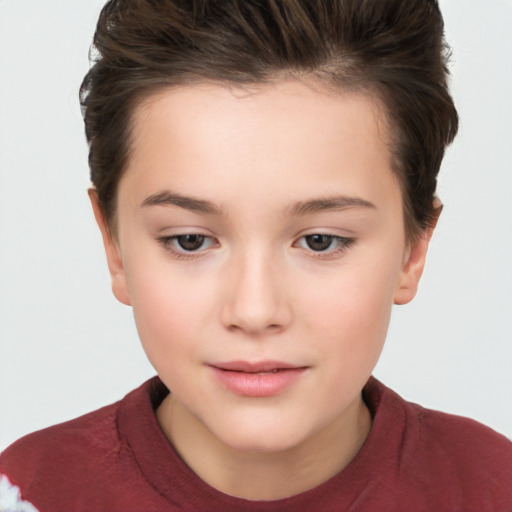 Joyful white child female with short  brown hair and brown eyes